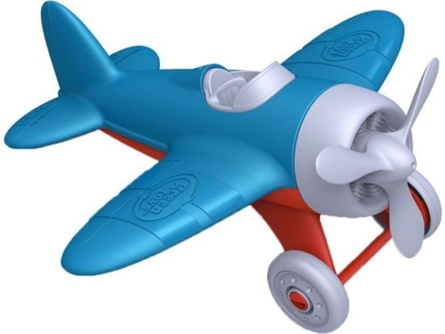 Grünes Spielzeug Flugzeug Blau